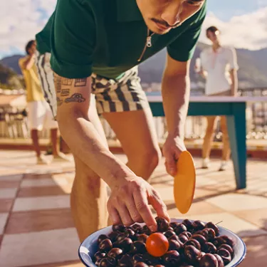 guy playing cherry pong